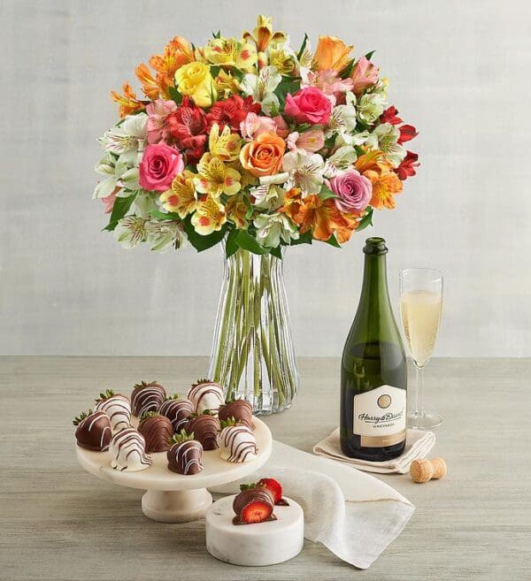 Assorted Roses & Peruvian Lilies, Gourmet Drizzled Strawberries, And Sparkling White Wine by Harry & David